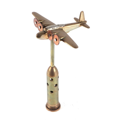 53 - A trench art cast brass model of a Southerland aircraft, mounted on a brass plinth, wingspan 16cm.