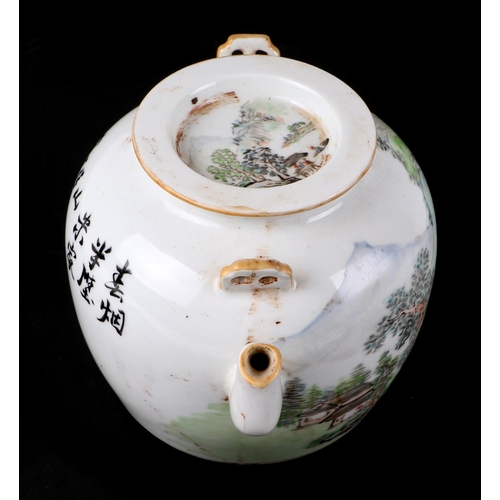 530 - A Chinese Republic style teapot and cover decorated with a river landscape scene and calligraphy, re... 