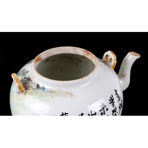 530 - A Chinese Republic style teapot and cover decorated with a river landscape scene and calligraphy, re... 