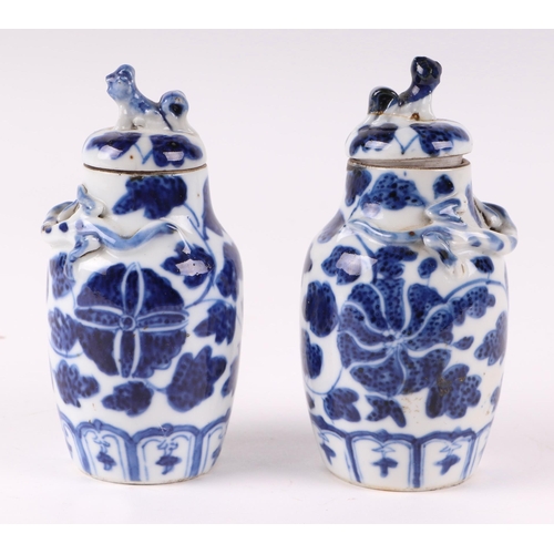 535 - A group of Chinese and Japanese blue & white miniature vases, the largest 11.5cms high (6).