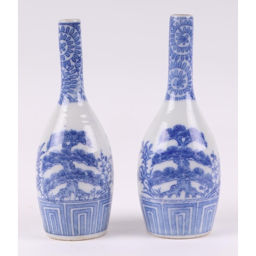 535 - A group of Chinese and Japanese blue & white miniature vases, the largest 11.5cms high (6).