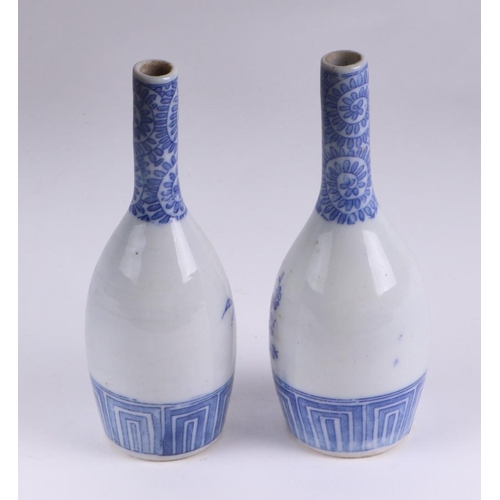 535 - A group of Chinese and Japanese blue & white miniature vases, the largest 11.5cms high (6).