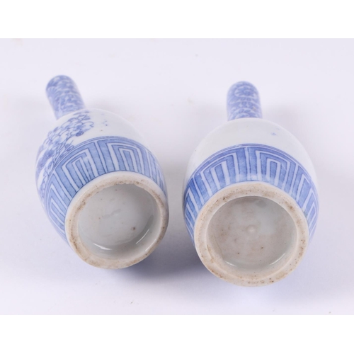 535 - A group of Chinese and Japanese blue & white miniature vases, the largest 11.5cms high (6).