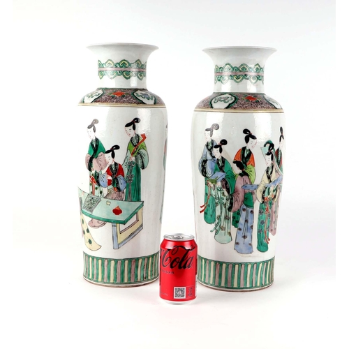 536 - A large pair of Chinese famille vert vases decorated with figures, six character blue mark to the un... 