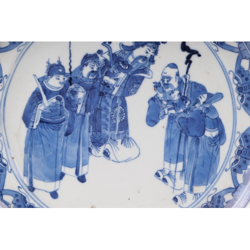 543 - A Chinese blue & white plate depicting Shoulau presenting a small boy to deities, four character blu... 