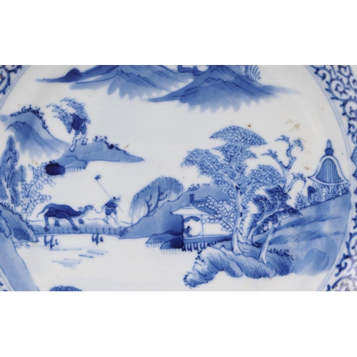 543 - A Chinese blue & white plate depicting Shoulau presenting a small boy to deities, four character blu... 