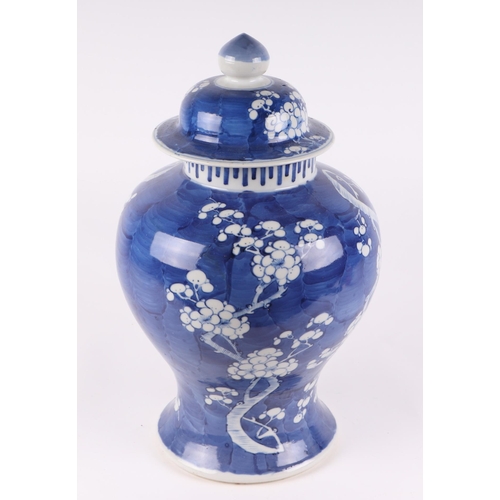 546 - A large Chinese blue & white prunus jar and cover, 40cms high.Condition ReportSome small losses to t... 