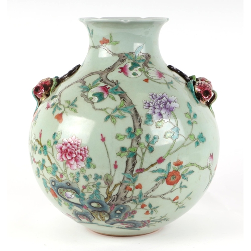 547 - A large Chinese famille rose vase, the decoration depicting peonies, pomegranates and bats with pome... 