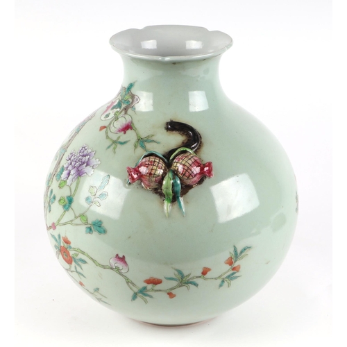 547 - A large Chinese famille rose vase, the decoration depicting peonies, pomegranates and bats with pome... 