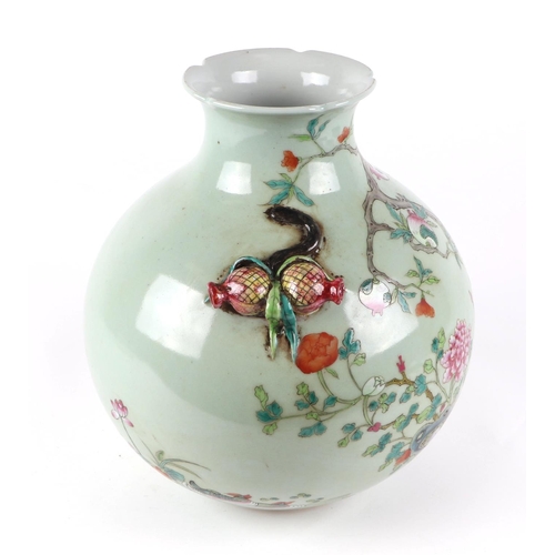 547 - A large Chinese famille rose vase, the decoration depicting peonies, pomegranates and bats with pome... 