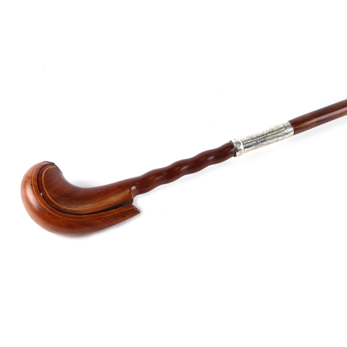 55 - A novelty partridge wood swordstick with mahogany handle which opens to reveal a compartment to cont... 