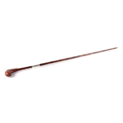 55 - A novelty partridge wood swordstick with mahogany handle which opens to reveal a compartment to cont... 