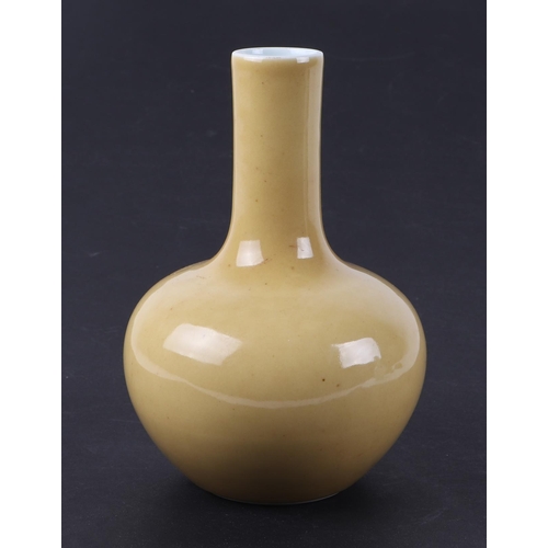 556 - A Chinese yellow monochrome bottle vase on stand, 17cms high; together with a Chinese white glazed m... 