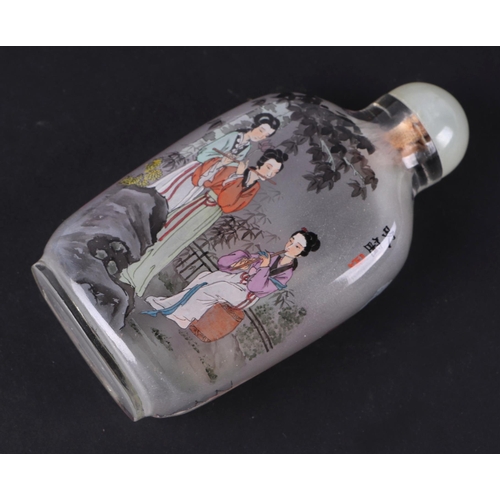 558 - A group of Chinese porcelain and reverse painted glass snuff bottles, the largest 8cms high (6).