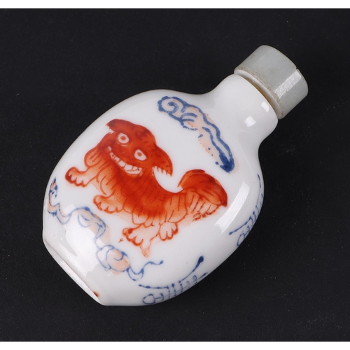 558 - A group of Chinese porcelain and reverse painted glass snuff bottles, the largest 8cms high (6).