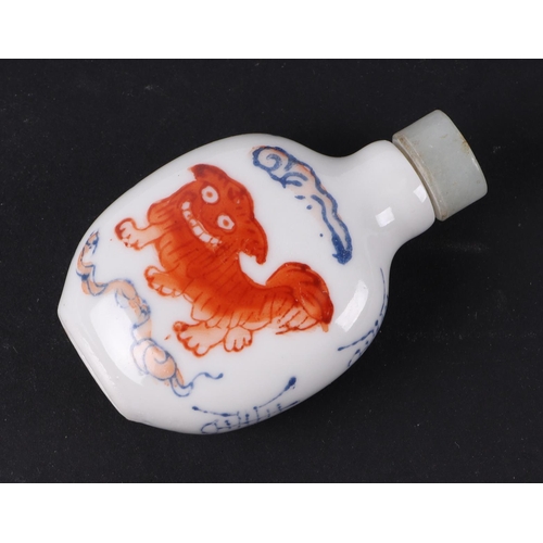 558 - A group of Chinese porcelain and reverse painted glass snuff bottles, the largest 8cms high (6).