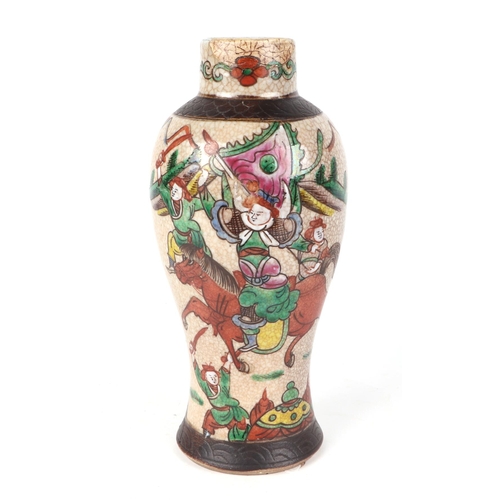 564 - A Chinese famille rose jar and cover decorated with figures in a landscape, 24cms high; together wit... 