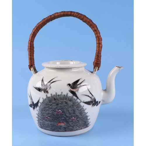 566 - A Chinese famille rose teapot decorated with butterflies, swallows and flowers, red seal mark to the... 