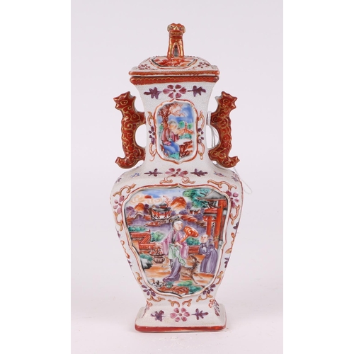 575 - A pair of Chinese Mandarin palette famille rose Export vases and covers moulded in relief with oppos... 