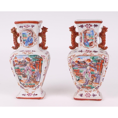 575 - A pair of Chinese Mandarin palette famille rose Export vases and covers moulded in relief with oppos... 