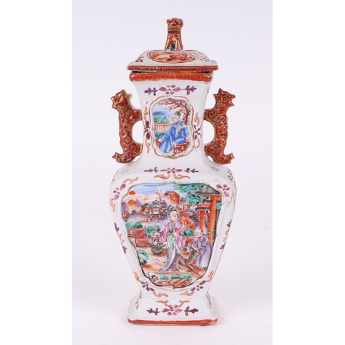 575 - A pair of Chinese Mandarin palette famille rose Export vases and covers moulded in relief with oppos... 