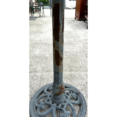 6 - A metal bird bath on octagonal column and circular base, 48cms diameter.