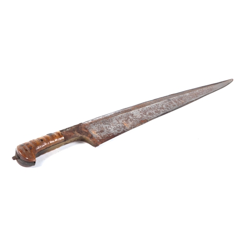 67 - A large 19th century Khyber knife with horn handle and brass mounted leather scabbard, overall 75cm,... 