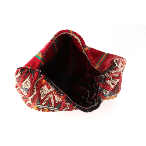 82 - A Turkish carpet bag with geometric design, 47 by 39cms.