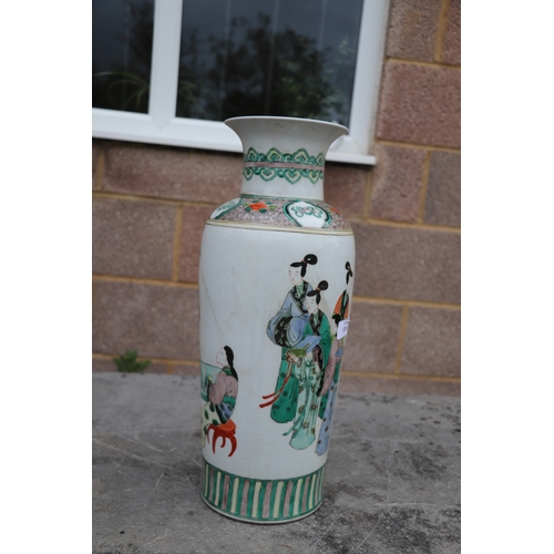 536 - A large pair of Chinese famille vert vases decorated with figures, six character blue mark to the un... 