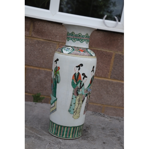 536 - A large pair of Chinese famille vert vases decorated with figures, six character blue mark to the un... 