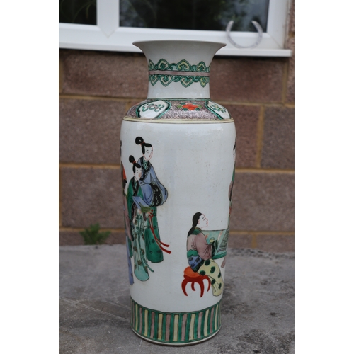 536 - A large pair of Chinese famille vert vases decorated with figures, six character blue mark to the un... 