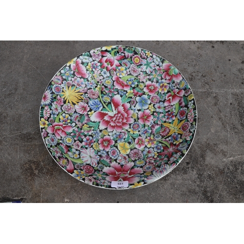 551 - A large Chinese millefiori bowl with six character red mark to the underside, 40cms diameter.