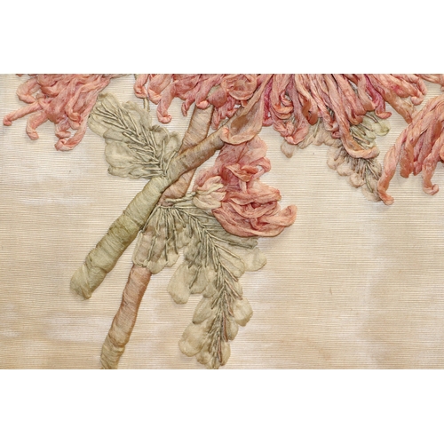 88 - An embroidered and needlework silk panel depicting chrysanthemums, 40 by 33cms, framed.