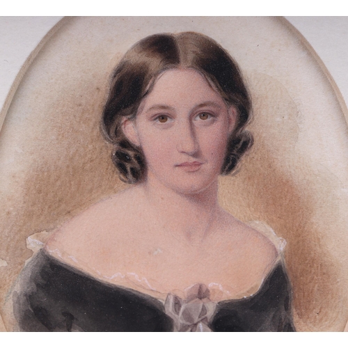 206 - 19th century Victorian school - a pair of oval bust portraits of Miss Martin, watercolour heightened... 