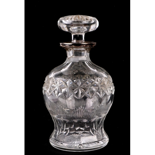 265 - A cut glass baluster form decanter with silver coloured metal collar, 20cms high (a/f).