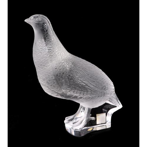 272 - A Lalique frosted glass model of a standing partridge with etched signature, 17cms high.