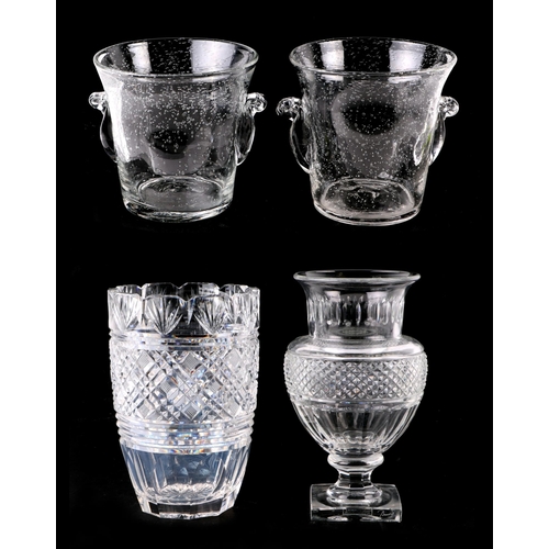 276 - A Baccarat cut glass pedestal vase, 22cms high; together with a cut glass vase, 20cms high; and a pa... 