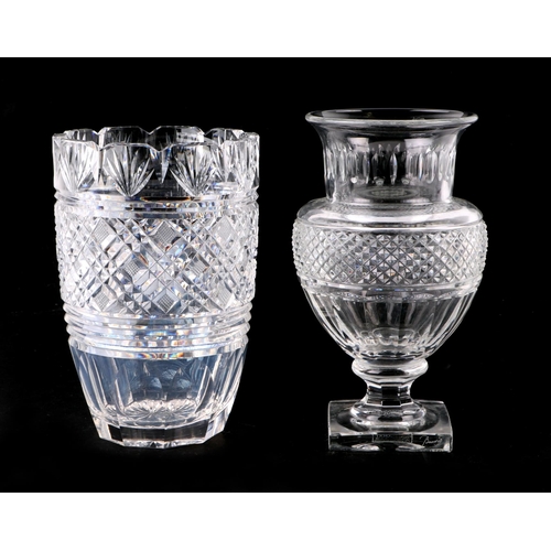 276 - A Baccarat cut glass pedestal vase, 22cms high; together with a cut glass vase, 20cms high; and a pa... 