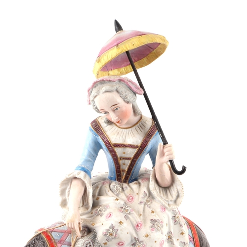 292 - An 18th century style continental group depicting a young lady holding a parasol riding a donkey, ap... 