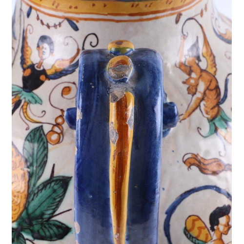 296 - An Italian Maiolica twin-handled apothecary jar and cover (possibly 17th century), 40cms high.Condit... 