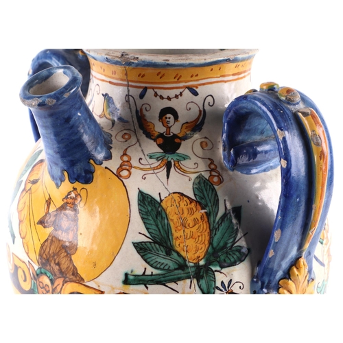 296 - An Italian Maiolica twin-handled apothecary jar and cover (possibly 17th century), 40cms high.Condit... 