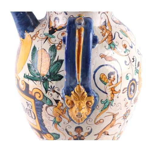 296 - An Italian Maiolica twin-handled apothecary jar and cover (possibly 17th century), 40cms high.Condit... 