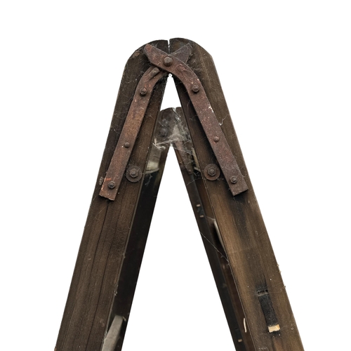 3 - A large pair of pine 'A' frame trestle supports with iron hinges, 243cms high (2).