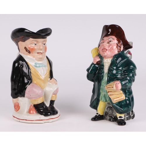 311 - A Ridgeway pottery character jug depicting a town crier, 23cms high; together with another character... 