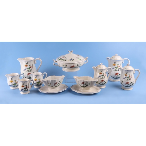 324 - A large quantity of Gien, France, dinner and tea wares to include tureens, dinner plates, side plate... 