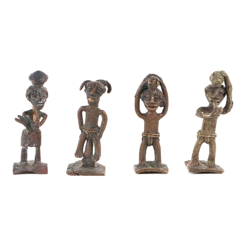 330 - A collection of ten West African bronze Ashanti gold weights, some modelled as tribal figures (10).