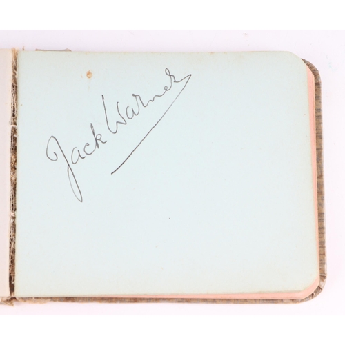 34 - An early 20th century autograph book with various actors and personalities signatures to include Cha... 