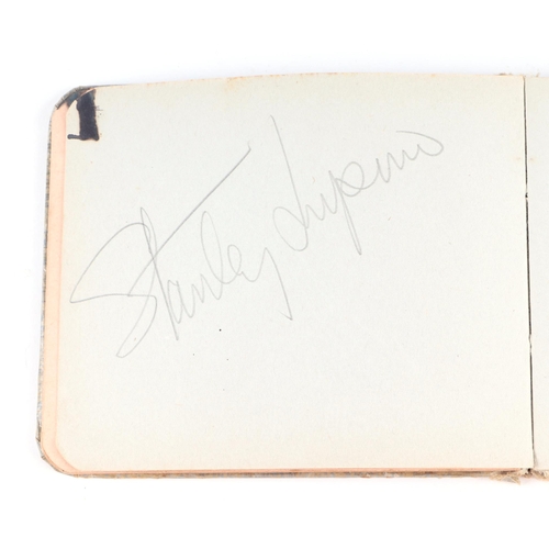 34 - An early 20th century autograph book with various actors and personalities signatures to include Cha... 