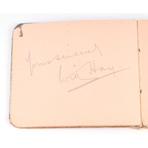 34 - An early 20th century autograph book with various actors and personalities signatures to include Cha... 