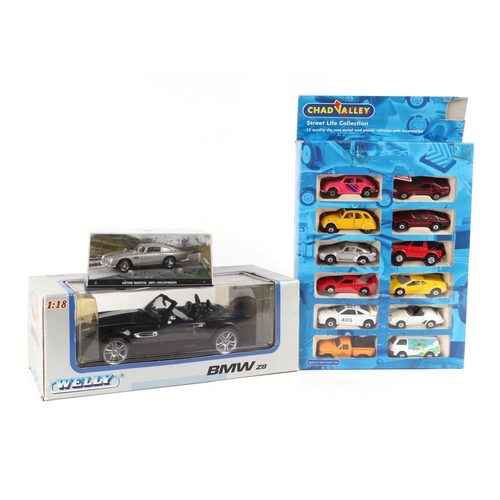 354 - A boxed Chad Valley collection containing twelve diecast cars; a Welly 1:18 scale BMW Z8; together w... 